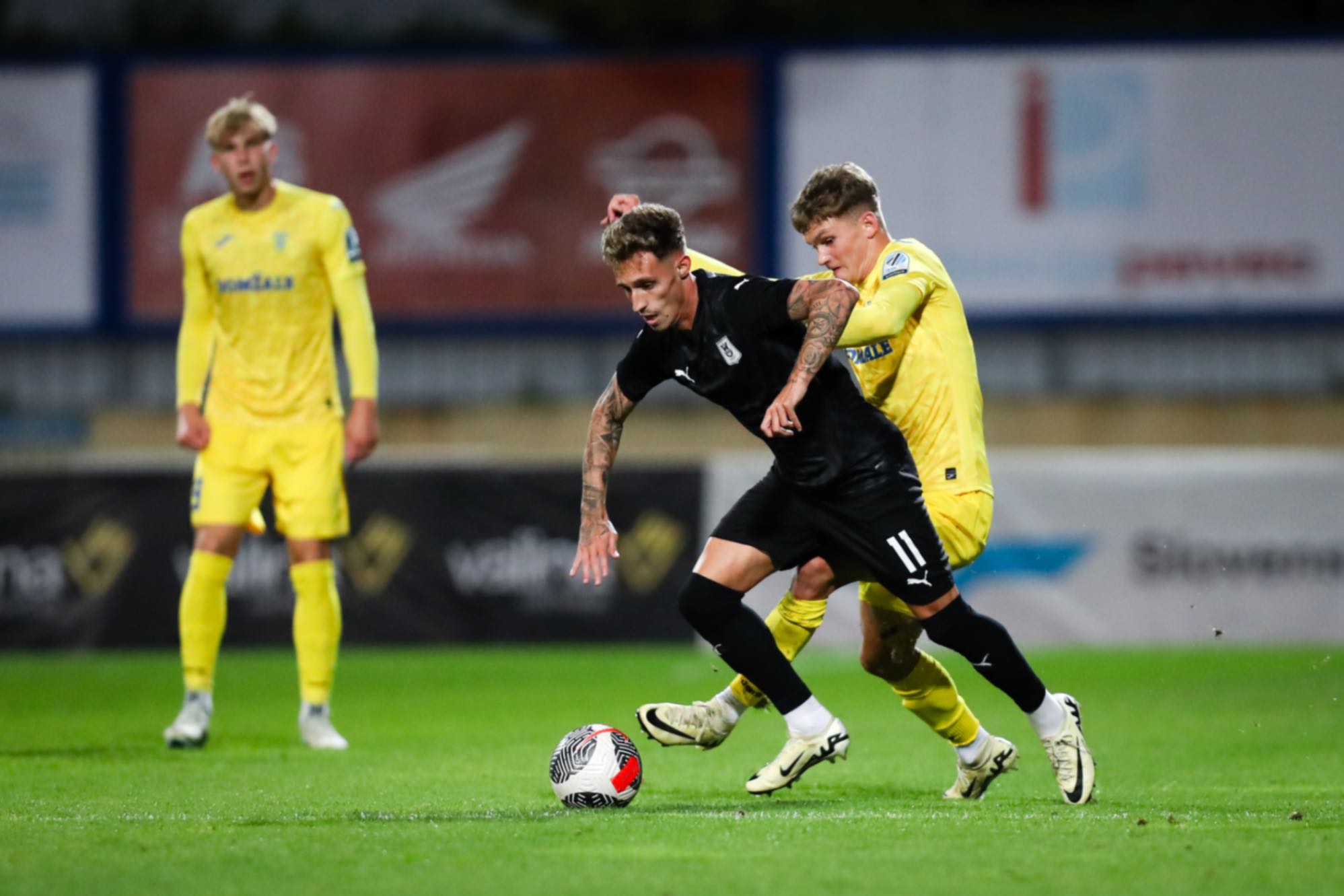 Lorber in Milić v ozadju